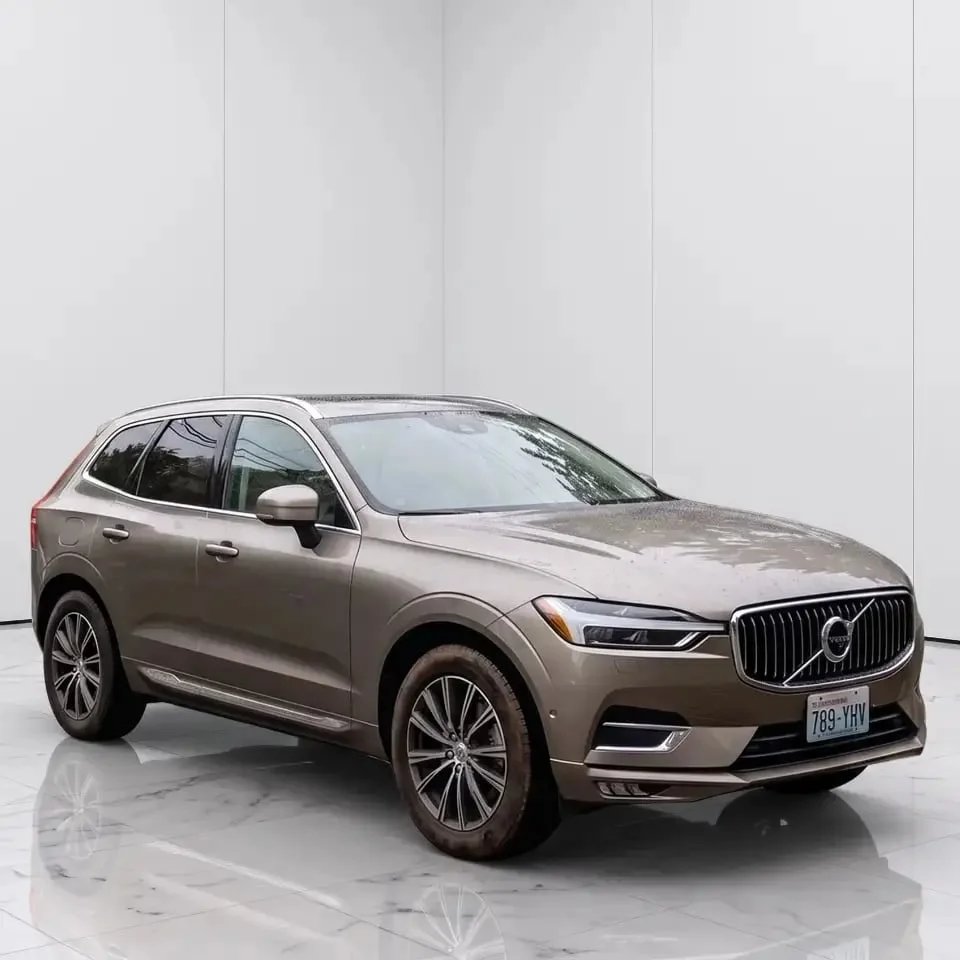 A car on a clean studio backdrop after car background removal